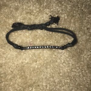 Black bracelet.
